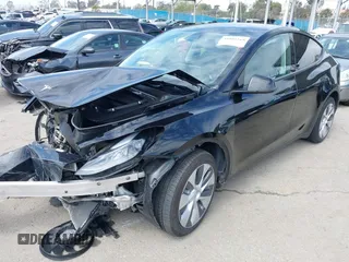 2023 Tesla Model Y Long Range z VIN 7SAYGDEE2PF863200, wystawiony jako IAAI lot #41805168 z przebiegiem 25 480 mil mil oraz . Historia ofert i sprzedaży dostępna na DreamBid. Obrazek 23.