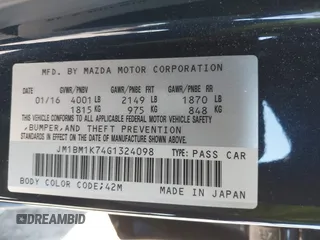 2016 Mazda 3 i Sport with VIN JM1BM1K74G1324098, listed as a IAAI auction lot 41700049 with 28,539 mi miles and . Bid and sale history available at DreamBid. Image 9.