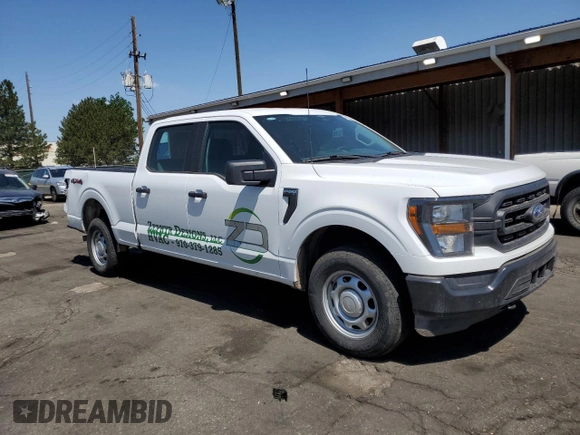 2023 Ford F-150 XL with VIN 1FTFW1E89PKD98613, listed as a Copart auction lot 61860785 with 25,568 mi miles and Salvage title. Bid and sale history available at DreamBid. Image 4.