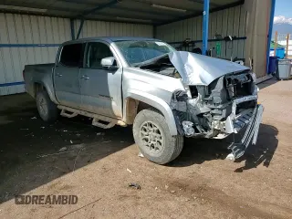 2022 Toyota Tacoma SR z VIN 3TMCZ5AN2NM470545, wystawiony jako Copart lot #58419285 z przebiegiem 57 599 mil mil oraz Szkoda całkowita • Salvage title. Historia ofert i sprzedaży dostępna na DreamBid. Obrazek 13.