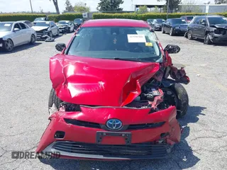 2020 Toyota Prius L Eco z VIN JTDKARFU0L3109596, wystawiony jako IAAI lot #41950366 z przebiegiem Nie podano mil oraz . Historia ofert i sprzedaży dostępna na DreamBid. Obrazek 11.