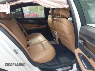 2013 BMW 7 Series 740i with VIN WBAYA6C52DD143862, listed as a IAAI auction lot 41859183 with 133,666 mi miles. Bid and sale history available at carsss.com. Image 8.