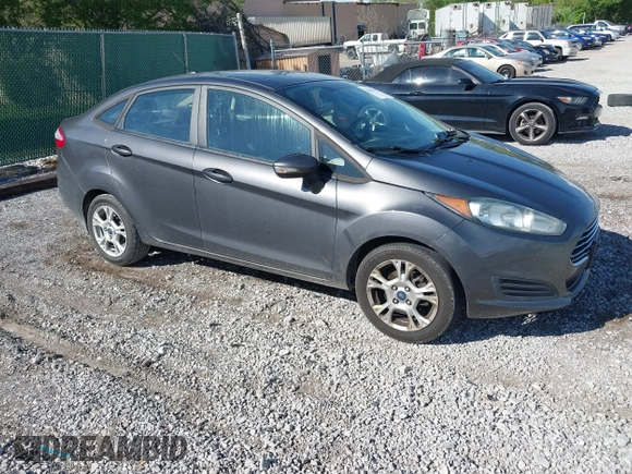 2015 Ford Fiesta SE z VIN 3FADP4BJ7FM158471, wystawiony jako IAAI lot #42090819 z przebiegiem 139 779 mil mil oraz . Historia ofert i sprzedaży dostępna na DreamBid. Obrazek 1.
