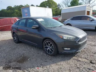 2017 Ford Focus SEL with VIN 1FADP3H22HL305908, listed as a IAAI auction lot 42084489 with 94,757 mi miles. Bid and sale history available at carsss.com. Image 1.