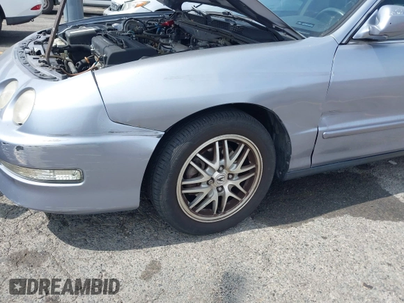 1999 Acura Integra z VIN JH4DB7660XS000593, wystawiony jako IAAI lot #42339059 z przebiegiem 77 805 mil mil oraz . Historia ofert i sprzedaży dostępna na DreamBid. Obrazek 6.