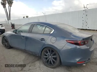2024 Mazda 3 S Carbon Edition with VIN 3MZBPBCM0RM403689, listed as a Copart auction lot 54277935 with 7,040 mi miles and Salvage Title. Bid and sale history available at DreamBid. Image 2.