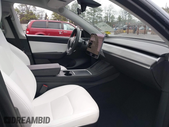 2022 Tesla Model Y Performance with VIN 7SAYGDEF7NF403701, listed as a IAAI auction lot 41961532 with 83,728 mi miles and . Bid and sale history available at DreamBid. Image 5.
