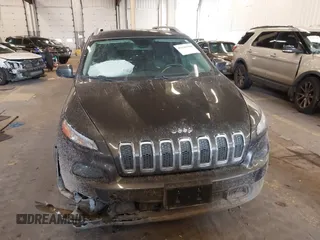 2014 Jeep Cherokee Latitude with VIN 1C4PJMCS4EW272815, listed as a IAAI auction lot 41616504 with 97,613 mi miles and . Bid and sale history available at carsss.com. Image 12.