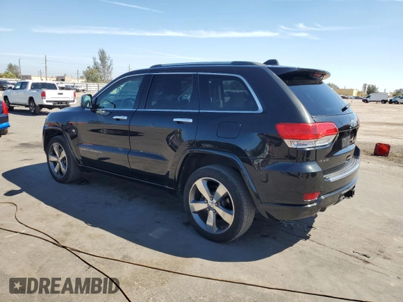 2015 Jeep Grand Cherokee Overland with VIN 1C4RJFCT6FC628729, listed as a Copart auction lot 50192705 with 106,102 mi miles and Salvage Title. Bid and sale history available at carsss.com. Image 2.