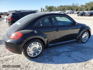 2012 Volkswagen Beetle 2.5L w/Sun PZEV with VIN 3VWJP7AT0CM659373, listed as a Copart auction lot 83368834 with 99,490 mi miles and Salvage Title. Bid and sale history available at carsss.com. Image 3.