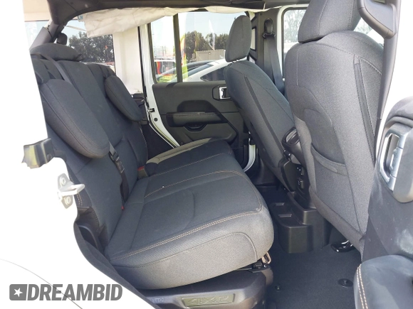 2024 Jeep Wrangler Sahara with VIN 1C4RJXP61RW126904, listed as a IAAI auction lot 41998215 with 32,034 mi miles and . Bid and sale history available at DreamBid. Image 8.