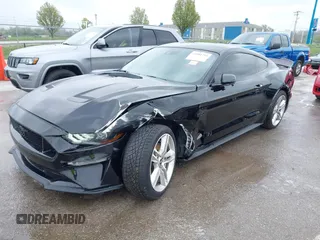 2021 Ford Mustang GT z VIN 1FA6P8CF2M5149643, wystawiony jako IAAI lot #41981794 z przebiegiem 57 345 mil mil oraz . Historia ofert i sprzedaży dostępna na DreamBid. Obrazek 17.