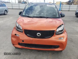 2016 Smart fortwo Passion z VIN WMEFJ5DAXGK069026, wystawiony jako Copart lot #53535045 z przebiegiem 34 410 mil mil oraz Tytuł czysty. Historia ofert i sprzedaży dostępna na DreamBid. Obrazek 5.