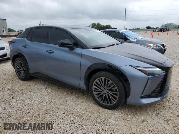 2023 Lexus RZ with VIN JTJAAAAB2PA004270, listed as a Copart auction lot 51979474 with 14,860 mi miles and Clean Title. Bid and sale history available at carsss.com. Image 4.