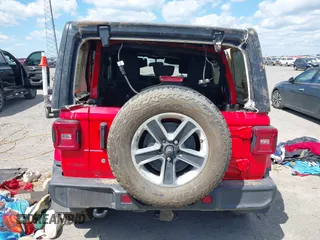 2018 Jeep Wrangler Unlimited Sahara with VIN 1C4HJXEG6JW174359, listed as a IAAI auction lot 42009968 with 79,830 mi miles and . Bid and sale history available at DreamBid. Image 17.