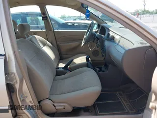 1999 Ford Escort LX z VIN 1FAFP10P7XW198467, wystawiony jako IAAI lot #42278961 z przebiegiem 293 835 mil mil oraz . Historia ofert i sprzedaży dostępna na DreamBid. Obrazek 5.