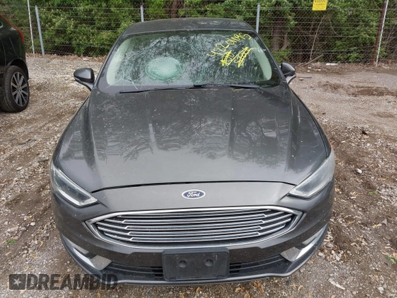 2017 Ford Fusion SE with VIN 3FA6P0HD3HR335350, listed as a IAAI auction lot 42201095 with 165,101 mi miles and . Bid and sale history available at DreamBid. Image 6.