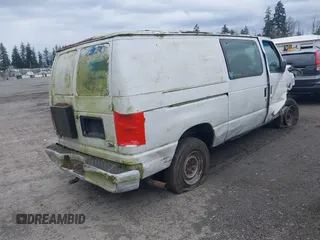 2000 Ford Econoline Cargo with VIN 1FTNE24LXYHB44580, listed as a IAAI auction lot 41906191 with 244,342 mi miles and . Bid and sale history available at DreamBid. Image 4.