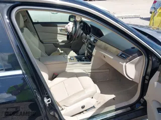 2014 Mercedes-Benz E-Class E 350 Luxury with VIN WDDHF8JB7EA791635, listed as a IAAI auction lot 41999708 with 133,509 mi miles. Bid and sale history available at carsss.com. Image 5.