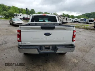 2021 Ford F-150 XL with VIN 1FTFX1E51MFC05216, listed as a Copart auction lot 56571785 with 94,584 mi miles and Salvage title. Bid and sale history available at DreamBid. Image 6.