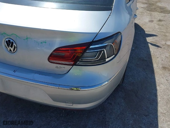 2013 Volkswagen CC Sport with VIN WVWBN7AN7DE556635, listed as a IAAI auction lot 41808795 with 88,482 mi miles. Bid and sale history available at carsss.com. Image 6.