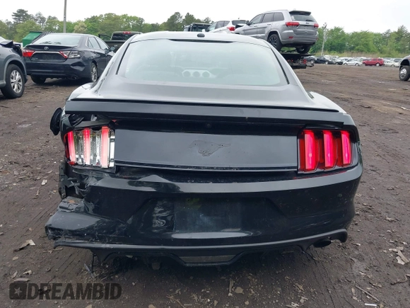 2016 Ford Mustang EcoBoost z VIN 1FA6P8TH8G5221774, wystawiony jako IAAI lot #42275505 z przebiegiem 111 115 mil mil oraz . Historia ofert i sprzedaży dostępna na DreamBid. Obrazek 16.