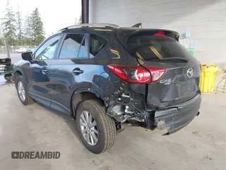 2016 Mazda CX-5 Touring with VIN JM3KE4CY4G0779827, listed as a IAAI auction lot 41840727 with 91,367 mi miles. Bid and sale history available at carsss.com. Image 3.