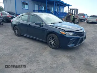 2019 Toyota Camry LE z VIN 4T1B11HK0KU726174, wystawiony jako IAAI lot #41546369 z przebiegiem 66 510 mil mil oraz . Historia ofert i sprzedaży dostępna na DreamBid. Obrazek 1.