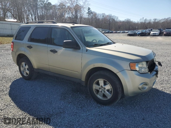2011 Ford Escape XLT with VIN 1FMCU0D72BKA34517, listed as a Copart auction lot 48661095 with 226,515 mi miles and Salvage Title. Bid and sale history available at carsss.com. Image 4.