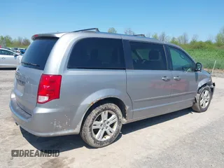 2013 Dodge Grand Caravan Crew with VIN 2C4RDGDG1DR800538, listed as a IAAI auction lot 42211140 with 138,647 mi miles and . Bid and sale history available at DreamBid. Image 4.