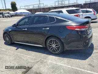 2018 Kia Optima Premium z VIN KNAGT4LE8J5023841, wystawiony jako Copart lot #61431235 z przebiegiem 193 841 mil mil oraz Czysty tytuł • Clean title. Historia ofert i sprzedaży dostępna na DreamBid. Obrazek 2.