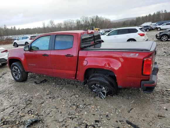 2021 Chevrolet Colorado 4WD Z71 with VIN 1GCGTDENXM1258477, listed as a Copart auction lot 82016974 with 40,231 mi miles and Salvage Title. Bid and sale history available at carsss.com. Image 2.