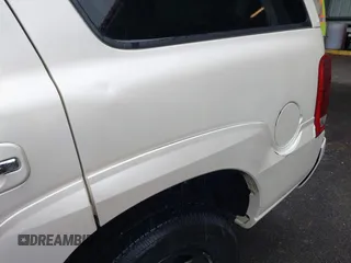 2006 Cadillac Escalade z VIN 1GYEK63N96R105841, wystawiony jako IAAI lot #41550887 z przebiegiem 311 218 mil mil oraz . Historia ofert i sprzedaży dostępna na DreamBid. Obrazek 12.