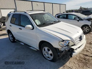 2005 Mercedes-Benz M-Class 3.7L with VIN 4JGAB57E55A559036, listed as a Copart auction lot 83024234 with 164,454 mi miles and Salvage Title. Bid and sale history available at carsss.com. Image 4.