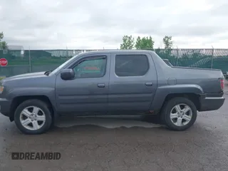 2014 Honda Ridgeline RTL with VIN 5FPYK1F5XEB011772, listed as a IAAI auction lot 42440390 with 145,219 mi miles and . Bid and sale history available at DreamBid. Image 14.
