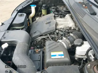 2008 Hyundai Tucson SE with VIN KM8JN12D18U917203, listed as a IAAI auction lot 43300609 with 119,847 mi miles and . Bid and sale history available at DreamBid. Image 13.