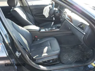 2014 BMW 3 Series 328d xDrive with VIN WBA3D5C57EKX98964, listed as a IAAI auction lot 41395268 with 135,272 mi miles. Bid and sale history available at carsss.com. Image 5.