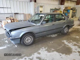 1989 BMW 3 Series 325i with VIN WBAAD2305KED23370, listed as a Copart auction lot 43777225 with 194,949 mi miles and Salvage Title. Bid and sale history available at carsss.com. Image 1.