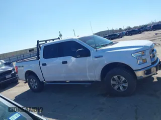2015 Ford F-150 XLT with VIN 1FTEW1EFXFKE27190, listed as a IAAI auction lot 41670252 with 250,077 mi miles. Bid and sale history available at carsss.com. Image 13.