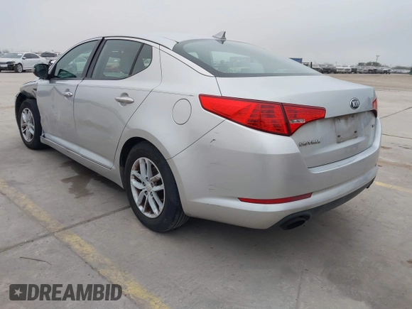 2013 Kia Optima LX with VIN KNAGM4A79D5377485, listed as a IAAI auction lot 41290306 with 172,253 mi miles. Bid and sale history available at carsss.com. Image 3.