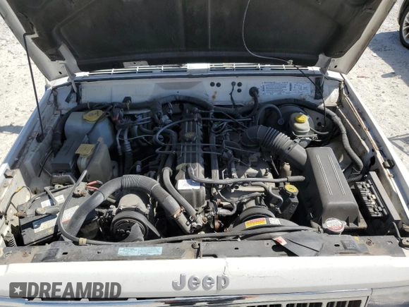 1996 Jeep Cherokee Sport with VIN 1J4FJ68S1TL128597, listed as a Copart auction lot 49600545 with 201,074 mi miles and Salvage title. Bid and sale history available at DreamBid. Image 12.