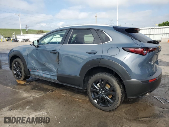 2022 Mazda CX-30 S Carbon Edition z VIN 3MVDMBCLXNM450913, wystawiony jako Copart lot #58537815 z przebiegiem 22 756 mil mil oraz Szkoda całkowita • Salvage title. Historia ofert i sprzedaży dostępna na DreamBid. Obrazek 2.