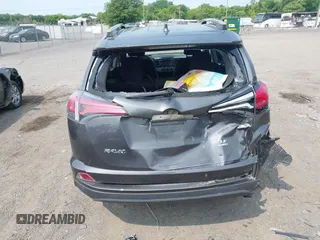 2017 Toyota RAV4 LE with VIN JTMBFREV6HD205665, listed as a IAAI auction lot 42436639 with 217,744 mi miles and . Bid and sale history available at DreamBid. Image 16.