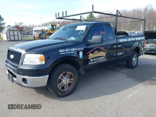 2007 Ford F-150 XL with VIN 1FTRF12277NA58372, listed as a IAAI auction lot 42090149 with 224,524 mi miles. Bid and sale history available at carsss.com. Image 2.