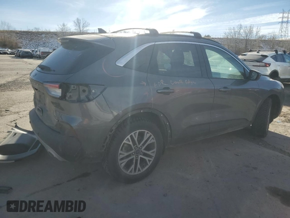 2021 Ford Escape SEL Hybrid z VIN 1FMCU9CZ9MUA86970, wystawiony jako Copart lot #84290064 z przebiegiem 32 019 mil mil oraz Szkoda całkowita • Salvage title. Historia ofert i sprzedaży dostępna na DreamBid. Obrazek 3.