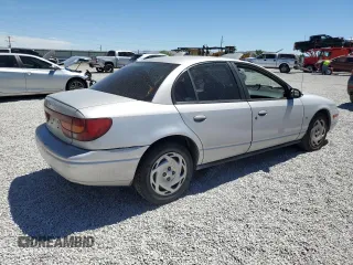 2001 Saturn SL with VIN 1G8ZK52731Z237050, listed as a Copart auction lot 60977394 with Not provided miles and Salvage title. Bid and sale history available at DreamBid. Image 3.