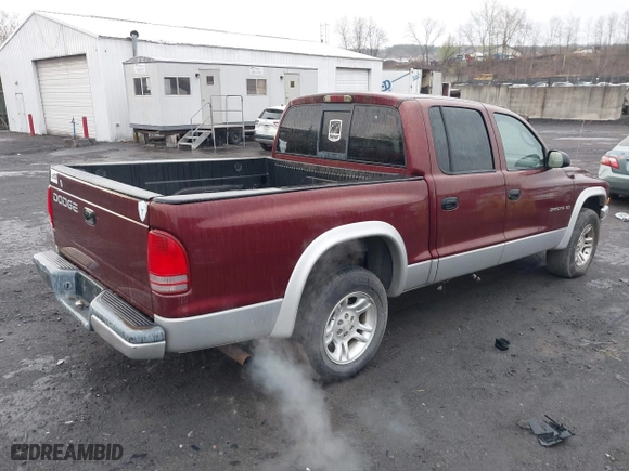2002 Dodge Dakota SLT with VIN 1B7HL48N62S694380, listed as a IAAI auction lot 42008125 with 152,421 mi miles. Bid and sale history available at carsss.com. Image 4.