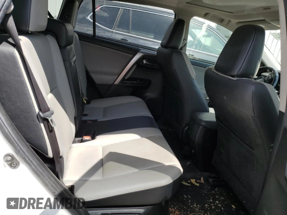 2016 Toyota RAV4 Limited z VIN JTMDJREVXGD054156, wystawiony jako Copart lot #56239415 z przebiegiem 127 849 mil mil oraz Szkoda całkowita • Salvage title. Historia ofert i sprzedaży dostępna na DreamBid. Obrazek 11.