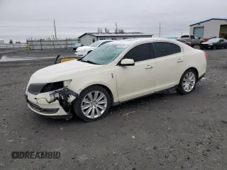 2014 Lincoln MKS EcoBoost z VIN 1LNHL9FT7EG601089, wystawiony jako Copart lot #49483605 z przebiegiem 121 709 mil mil oraz Szkoda całkowita • Salvage title. Historia ofert i sprzedaży dostępna na DreamBid. Obrazek 1.