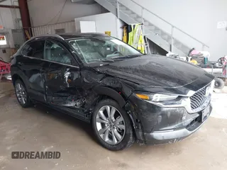 2023 Mazda CX-30 2.5 S Premium Package with VIN 3MVDMBDM5PM589289, listed as a IAAI auction lot 41331253 with 24,804 mi miles. Bid and sale history available at carsss.com. Image 1.